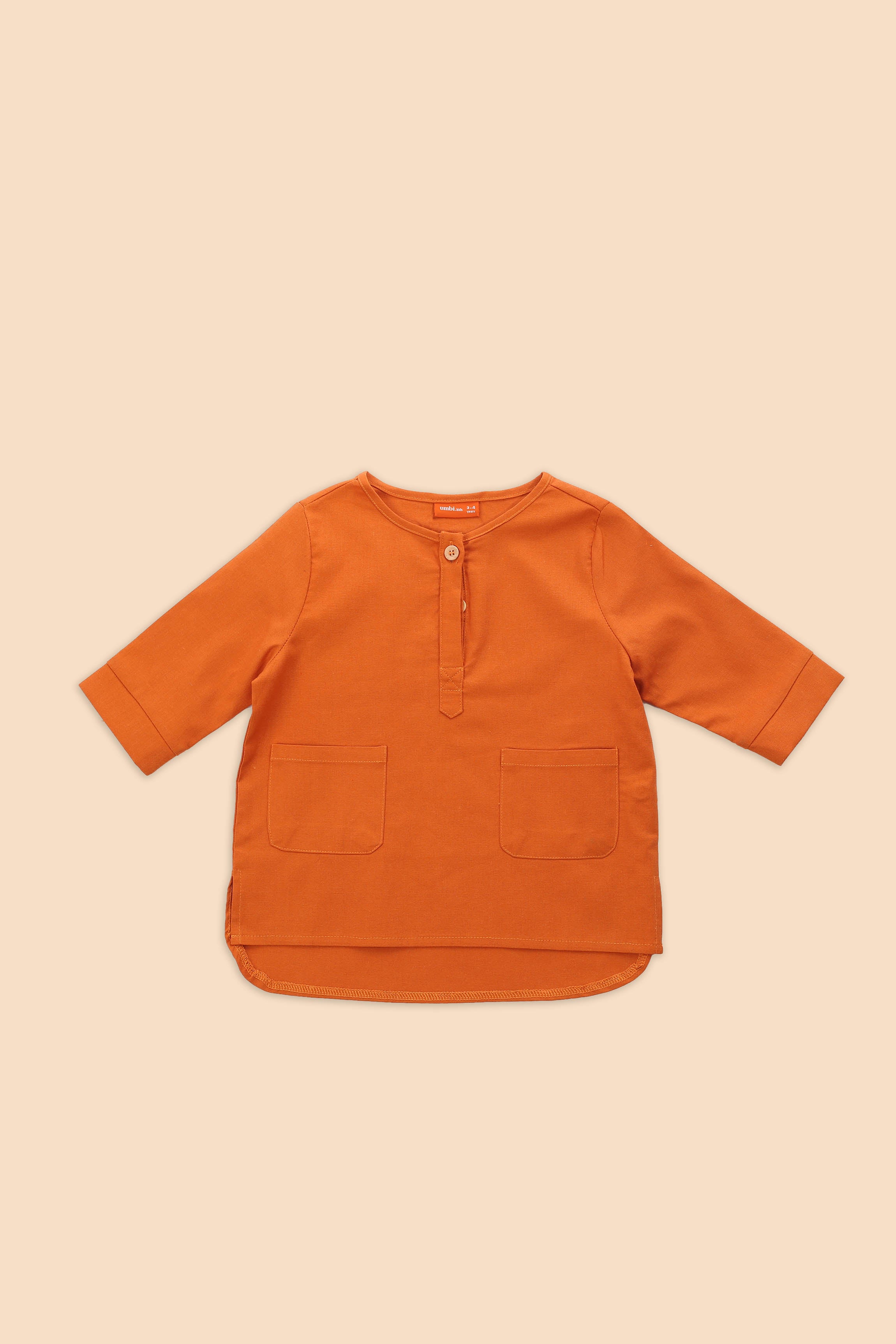 The Matahari Pair Pockets Kurta Top Orange